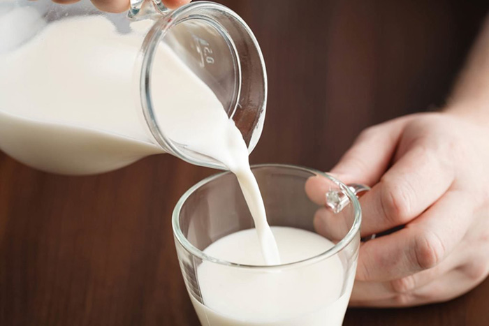 Lợi ích phụ nữ sau khi sinh uống sữa tươi không đường